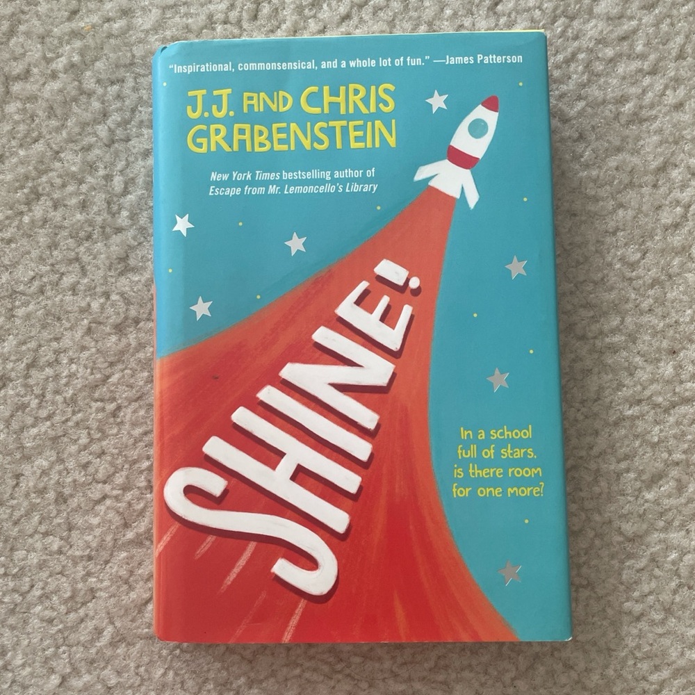 Shine! by J.J. and Chris Grabenstein Hardcover Chapter Book